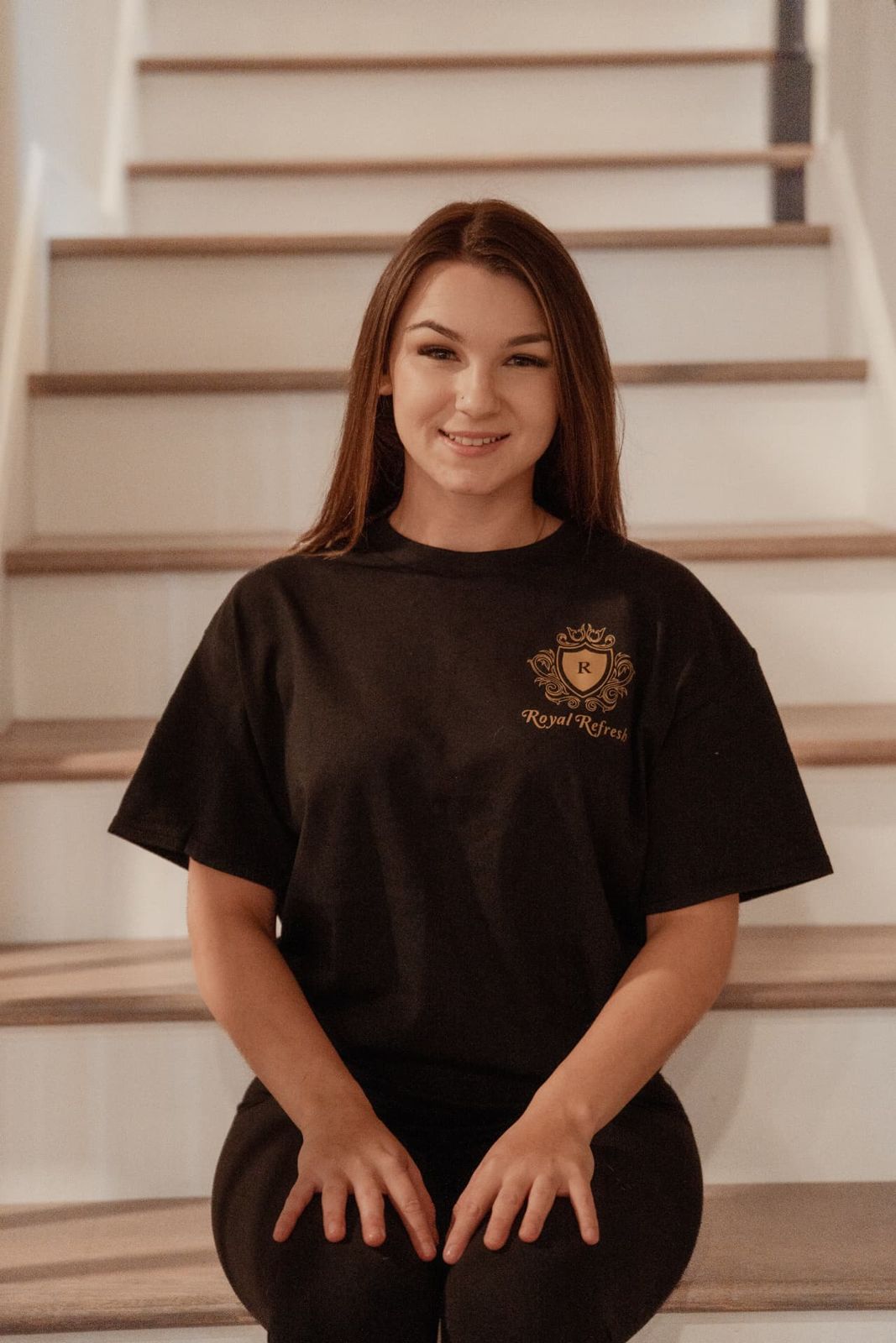 Royal Refresh Cleaning team member in uniform